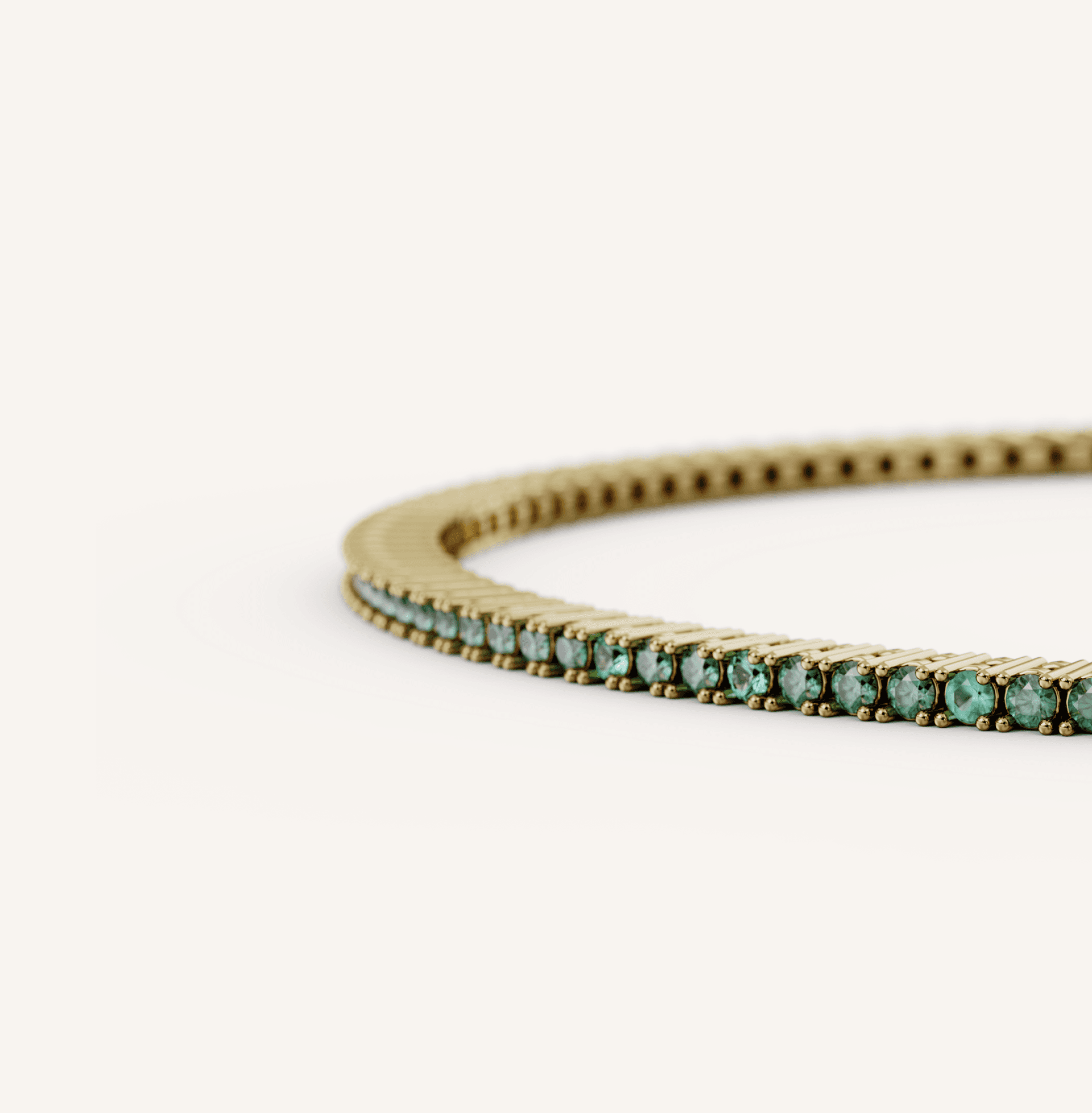 Tennis_Bracelet_1ct_YG_CloseUp_Emerald.png